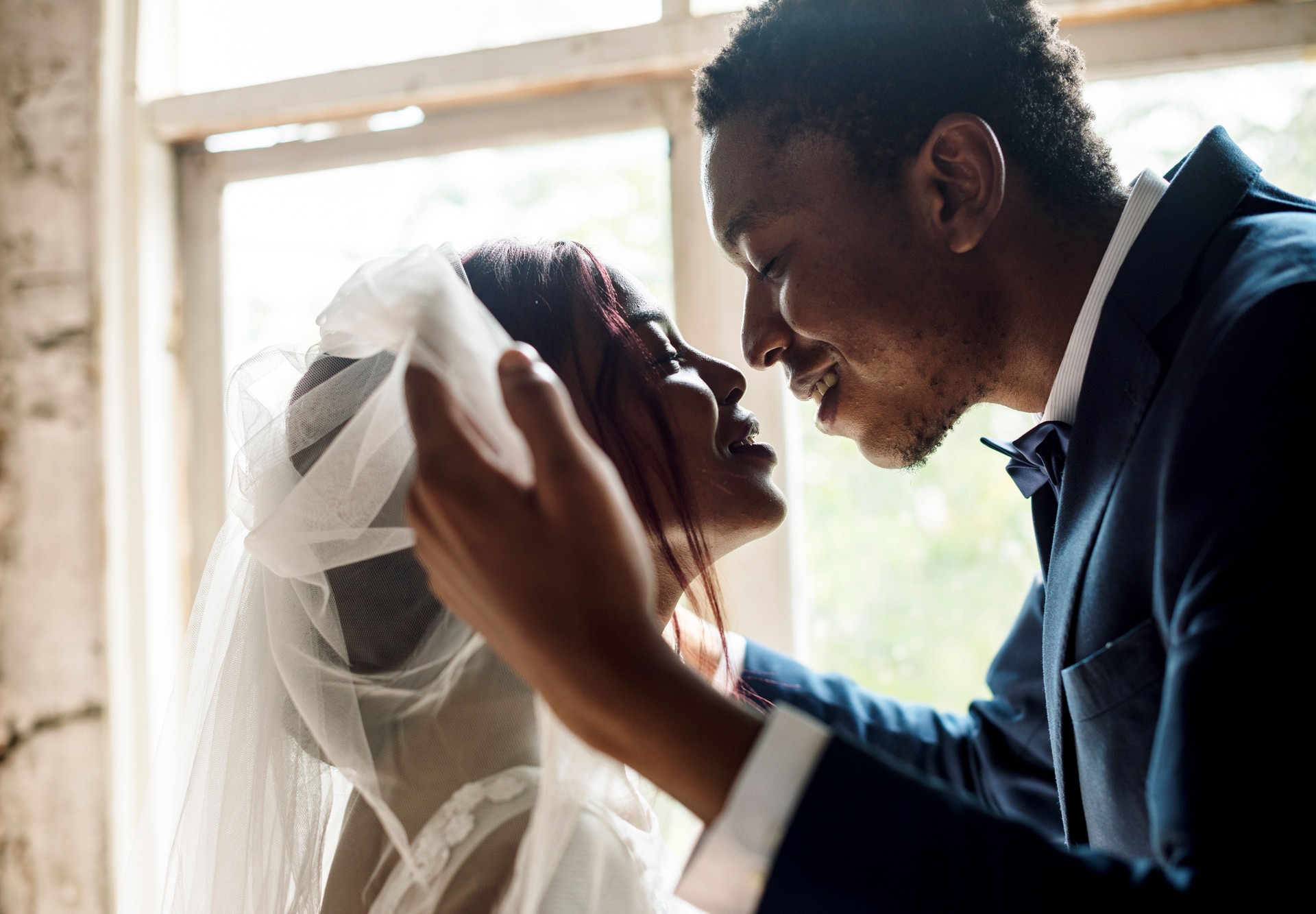 African Descent Groom Open Bride Veil Wedding Celebration